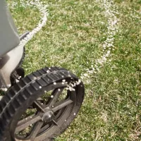 Applying lawn fertilizer